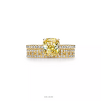 Engagement Ring with a Cushion-Cut Yellow Diamond and an 18K Yellow Gold Diamond Band