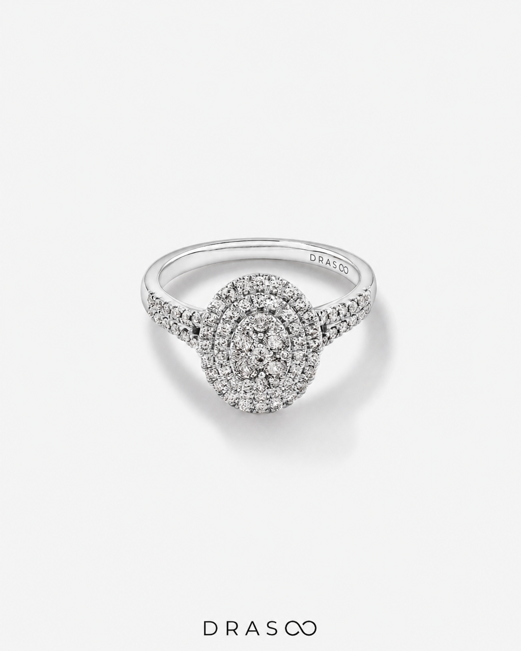 0.65 Carat TW Oval Shaped Cluster Halo Diamond Ring in 10kt White Gold