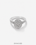 0.65 Carat TW Oval Shaped Cluster Halo Diamond Ring in 10kt White Gold