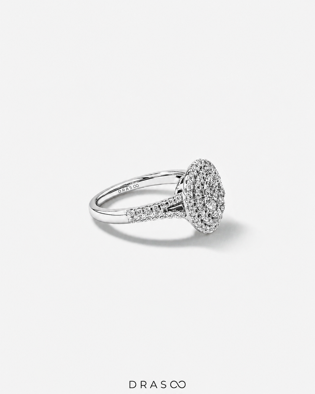 0.65 Carat TW Oval Shaped Cluster Halo Diamond Ring in 10kt White Gold