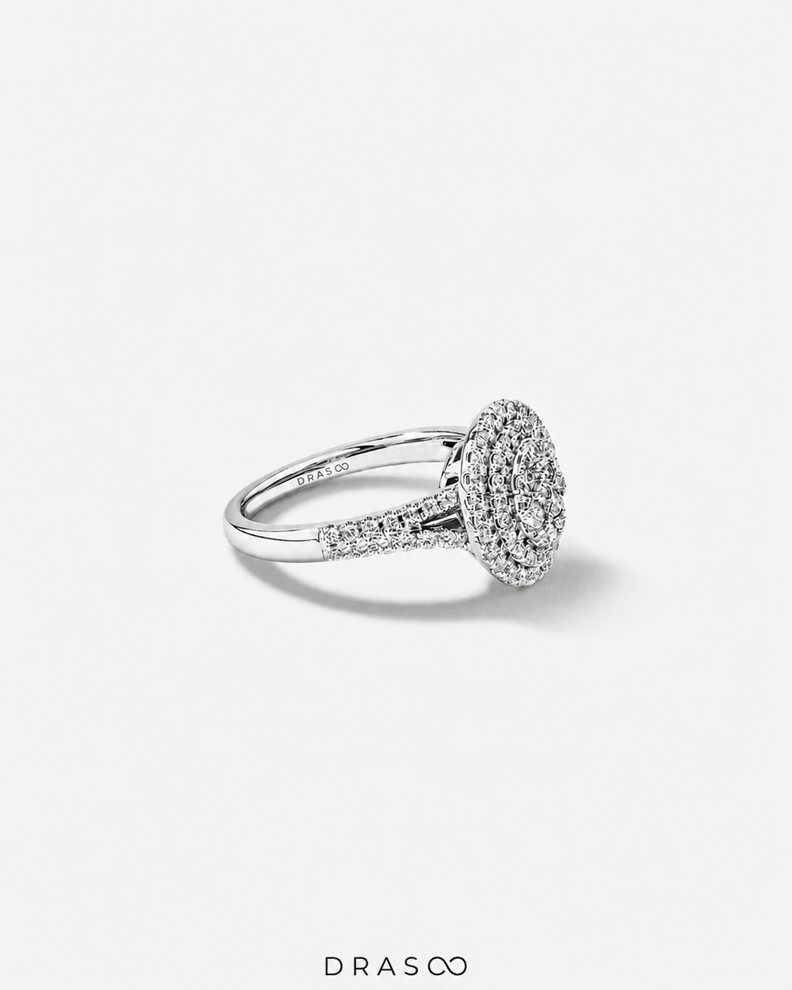 0.65 Carat TW Oval Shaped Cluster Halo Diamond Ring in 10kt White Gold